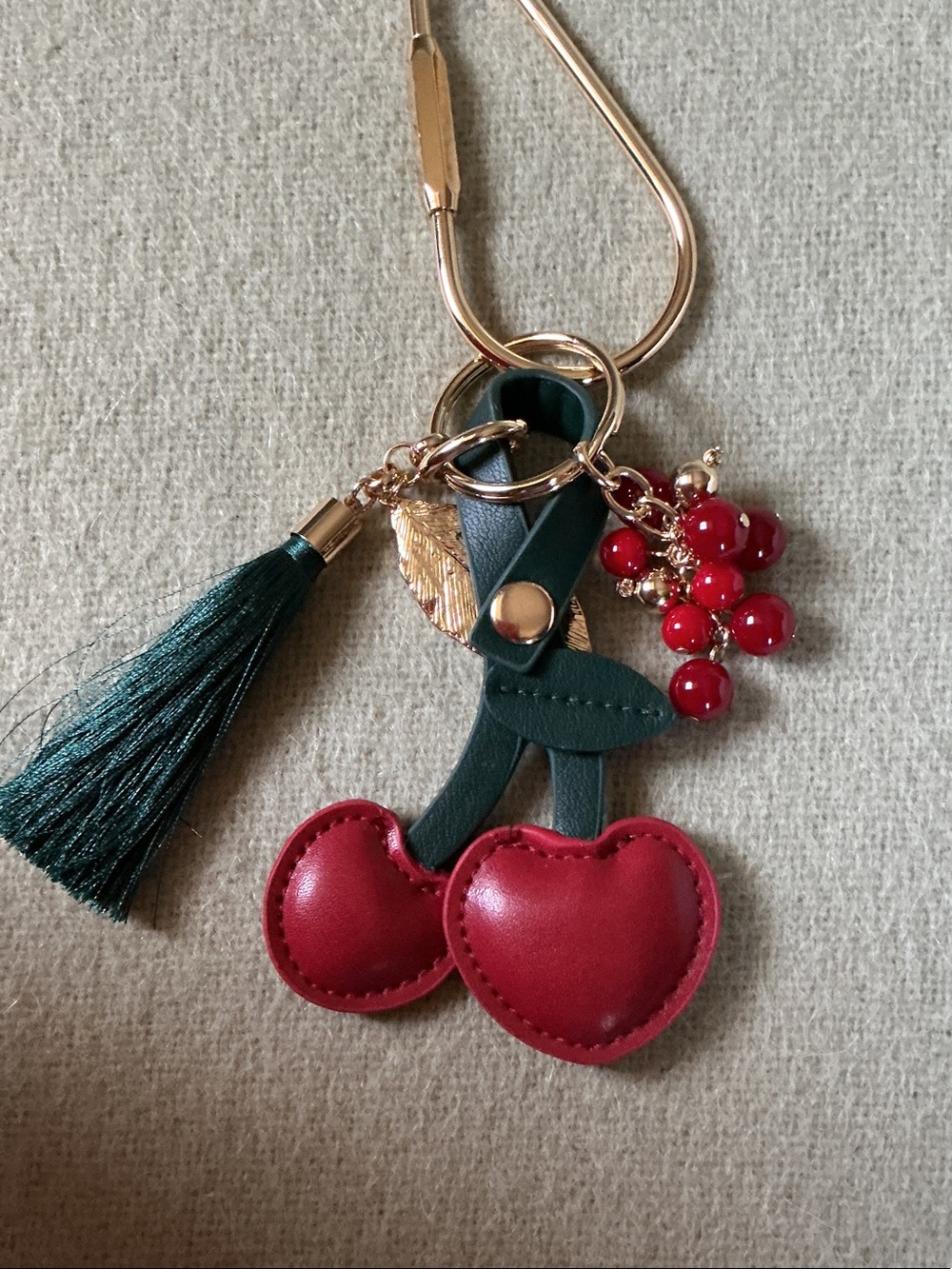 Chico's Red Cherry Leather Tassel Keychain with Green Stem and Gold Accents
